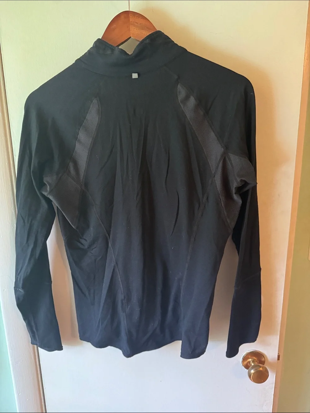 Nike Women's Black Half-Zip Performance Pullover with White Swoosh